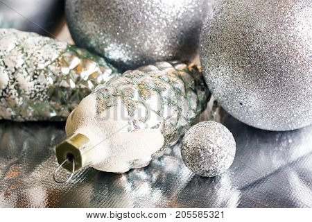 New year silver decoration on briliance background. Top view