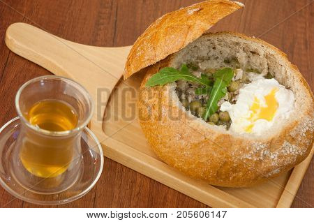 Soup In A Bread Bowl On The Board