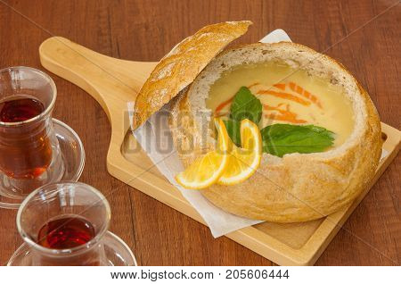 Soup In A Bread Bowl On The Board