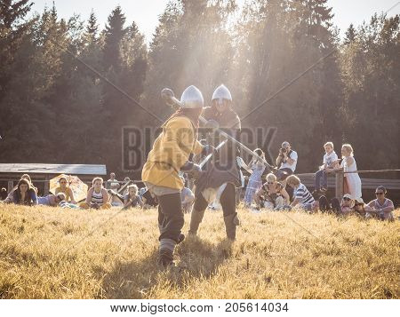 Moscow,russia-june 06,2016: Martial Duel Of Two Medieval Spearman Warriors. Opponents With Spear In