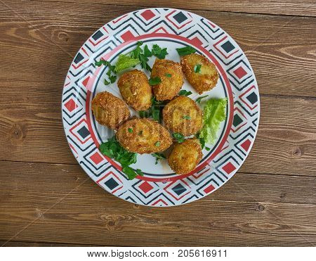 tandoori aloo tikka - spiced marinated potatoes which are either grilled or pan frie.Indian cuisine
