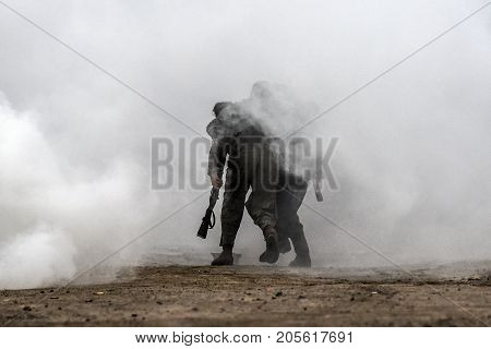 Gryfino Poland 23 september 2017: Historical reconstruction of the battle at Arnhem German soldiers in a cloud of smoke.