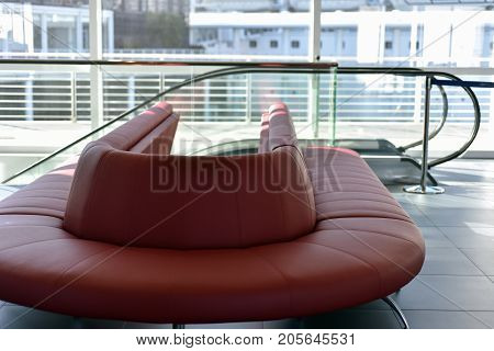 sofas and armchairs of a waiting room for travelers