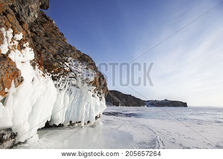 Icicles In Oltrek Island Rock. Winter Landscape Of Lake Baikal.