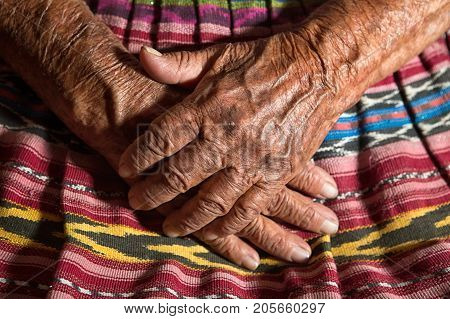 January 26, 2015 San Pedro La Laguna: Hands Of A Very Old Tzutujil Maya Woman In The Small Indigenou