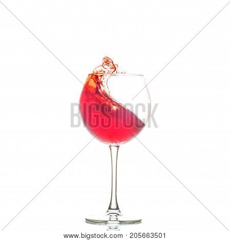 Red wine in a glass. The concept of alcoholic beverages restaurant cafe utensils holiday.