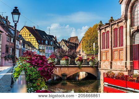 Colorful Traditional French Houses And Shops In Colmar, Alsace,