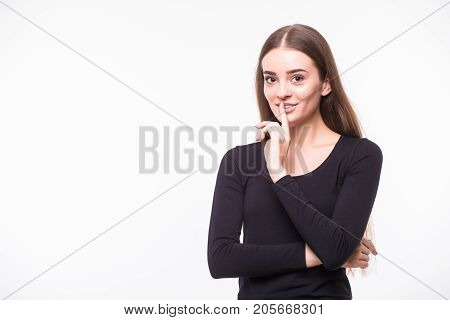Portrait Of Funny Young Caucasian Woman In White Shirt And Glasses With Hair Bun Holding Index Finge