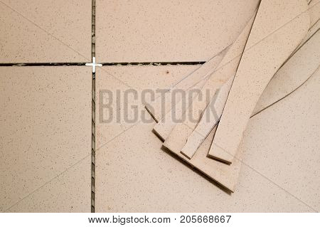 Tiling, Tile Trimming, Metering And Cutting. Repair Of The Floor. Sliced Gres Tiles.