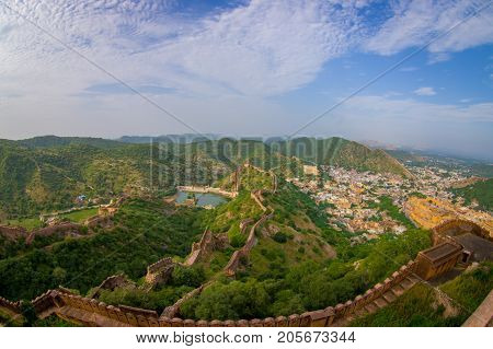 Beautiful view of the Amber fort in Rajasthan in Jaipur India with a stoned walls protecting the ancient indian palace, fish eye effect.