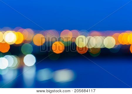 Defocused lights abstract colorful nonagon bokeh background