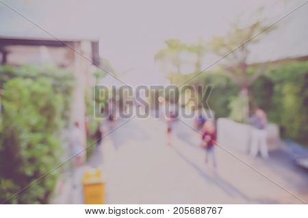Blurred Background,people Walking At Market Fair Outdoor With Bokeh Light,vintage Pale Filter