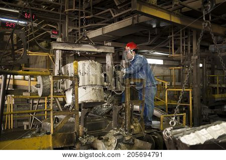 Padaeng industry Mae Sot Tak Thailand February20 2013 : Zinc mine. engineer control machine in factory.