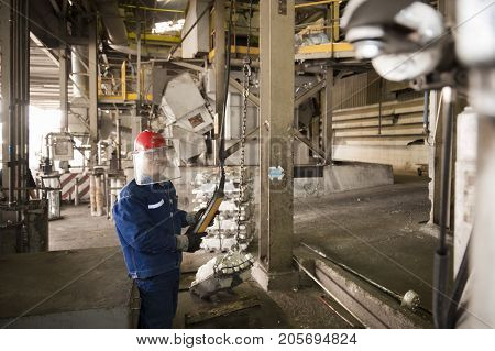 Padaeng industry Mae Sot Tak Thailand February20 2013 : Zinc mine. engineer control machine in factory.