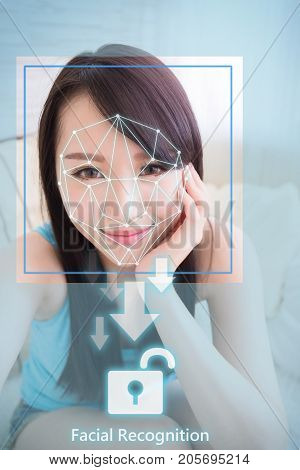 young woman is taking selfie for facial recognition concept