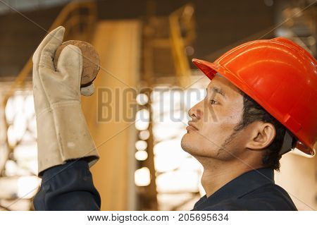 Padaeng industry Mae Sot Tak Thailand February20 2013 : Zinc mine. Engineer quality check mineral's.