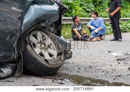 NAN THAILAND - OCT 25 : Car crash accident on the street of mountain over the photo blurred of Undefined casualty with nurse on the road on October 25 2016 in Nan province Thailand