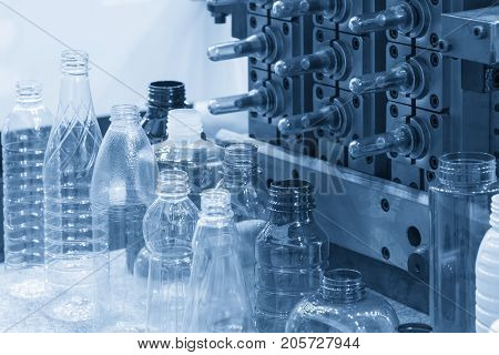 The sample of plastic bottle product and pre-shape part .Plastic bottle container product.