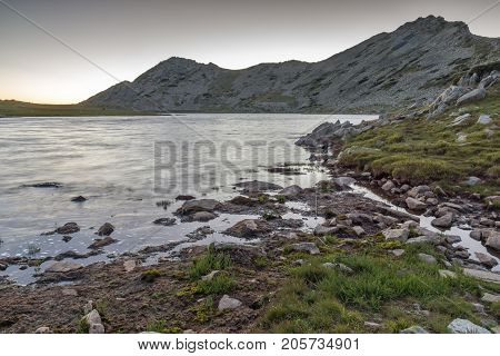 Sunset landscape with Valyavishki chukar  peak and Tevno lake, Pirin Mountain, Bulgaria