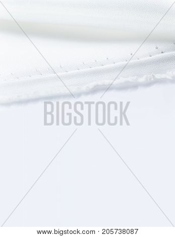 edge and seam of white fabric on white background white soft shadow room for text