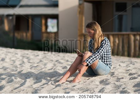 Beautiful girl holding a smartphone in the hands of a green screen green screen, hand of man holding mobile smart phone with chroma key green screen on white background, new technology concept