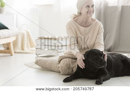Smiling Woman During Dog Therapy