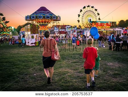 WEST WINDSOR NEW JERSEY - September 23 - Amusement park rides and plenty of people attended The 18th Annual Mercer County Italian American Festival on September 23 2017 in West Windsor NJ.