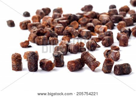 Granules of bee bread isolated on a white background. Apitherapy. Beekeeping products. Strengthening immunity