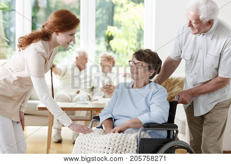 Nurse Saying Goodbye To Patient
