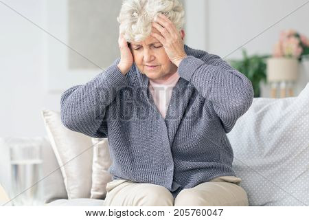 Elderly Woman Having Migraine Headache
