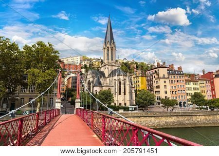 Pedestrian Saint Georges Footbridge And The Saint Georges Church In Lyon France In A Beautiful Summe
