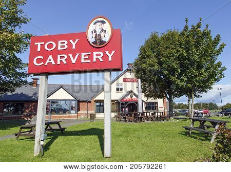 Swansea, UK: September 19, 2017: Front view of a Toby Carvery restaurant. Toby Carvery are a chain brand of over 150 restaurants established for over 30 years. Home of the Roast is their slogan.