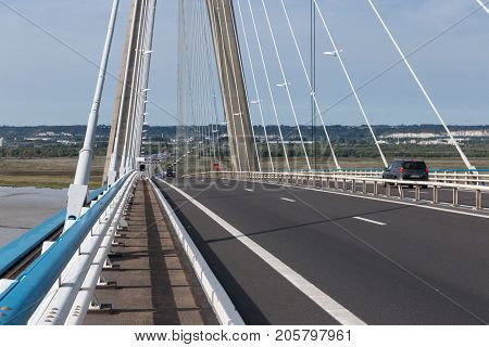 Pylon with steel cables from French bridge Pont de Normandie over river Seine