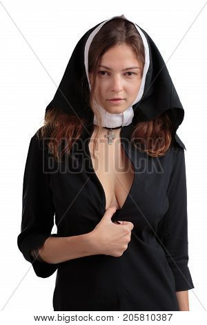 Pretty nun with candid decolletage. Religions game. Close-up of sweety girl. Religions concept.