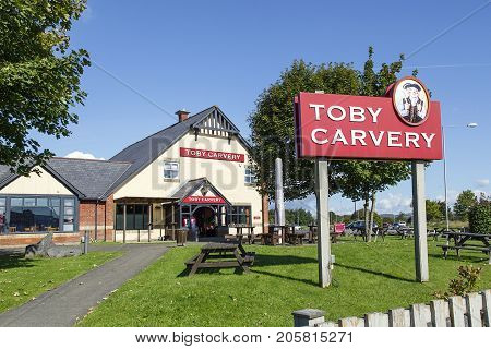 Swansea, UK: September 19, 2017: Front view of a Toby Carvery restaurant. Toby Carvery are a chain brand of over 150 restaurants established for over 30 years. Home of the Roast is their slogan.