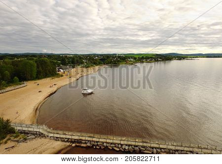 Aerial View Of A Lake Beach At Sunset