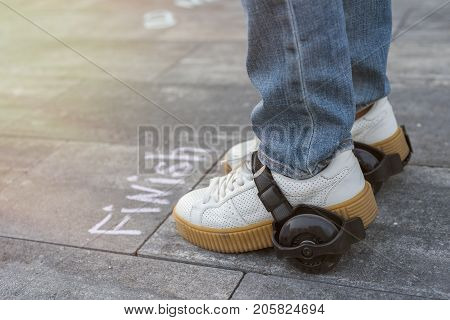 Quick finish. Feet shoe in the wheel in front of the word finish.