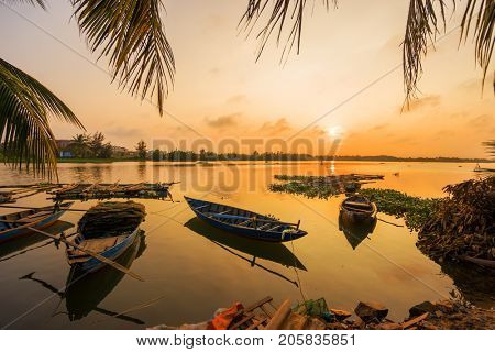 Vinh Cura Dai river in Hoi An Vietnam at sunset