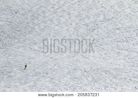 Skier Downhill On Snow Slope