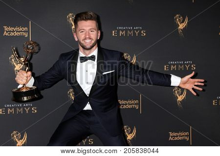 LOS ANGELES - SEP 9:  Travis Wall at the 2017 Creative Emmy Awards Press Room at the Microsoft Theater on September 9, 2017 in Los Angeles, CA