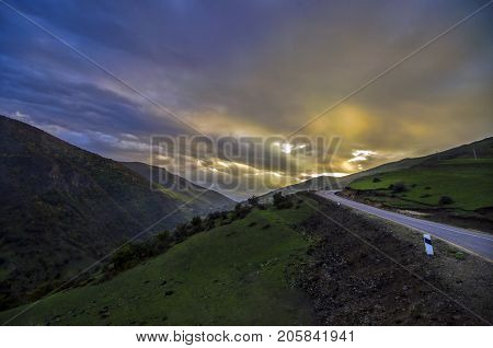 Cycling Mountain Road. Misty Mountain Road In High Mountains. Cloudy Sky With Mountain Road. Azerbai