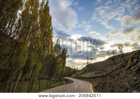 Cycling Mountain Road. Misty Mountain Road In High Mountains. Cloudy Sky With Mountain Road. Azerbai
