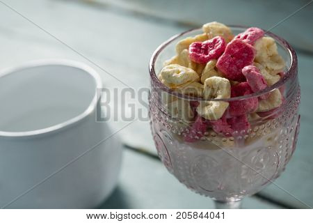 Close-up of honeycomb cereal in glass