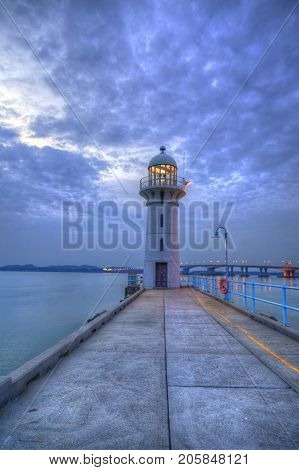 Nightfall On Singapore Lighthouse At Tuas