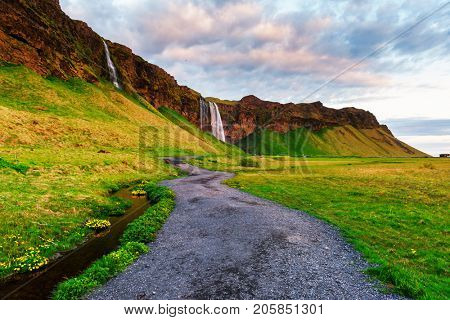 Sunrise on Seljalandfoss waterfall
