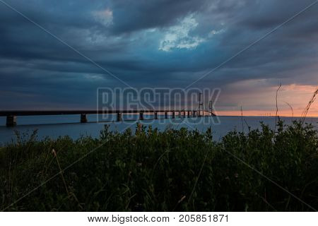 StorebÃÂ¦ltsbroen bridge. The sun is setting
