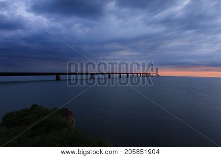 StorebÃÂ¦ltsbroen bridge. The sun is setting