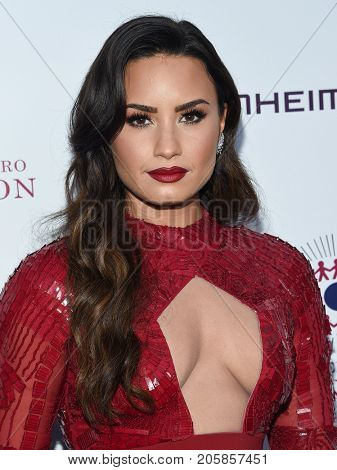 LOS ANGELES - SEP 09:  Demi Lovato arrives for the 2017 Brent Shapiro Foundation Summer Spectacular on September 9, 2017 in Beverly Hills, CA                
