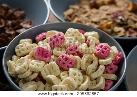 Close-up of honeycomb cereals in bowl