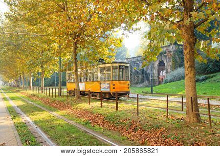 MILAN ITALY- OCTOBER 30 2016: Old vintage tram on the street of Milan Italy . Symbol of mobility ecology and alternative energy